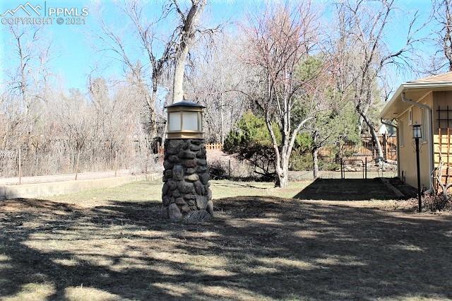 1014 West Cheyenne Road Colorado Springs, CO 80906 - Photo 26 of 32 Side Yard!