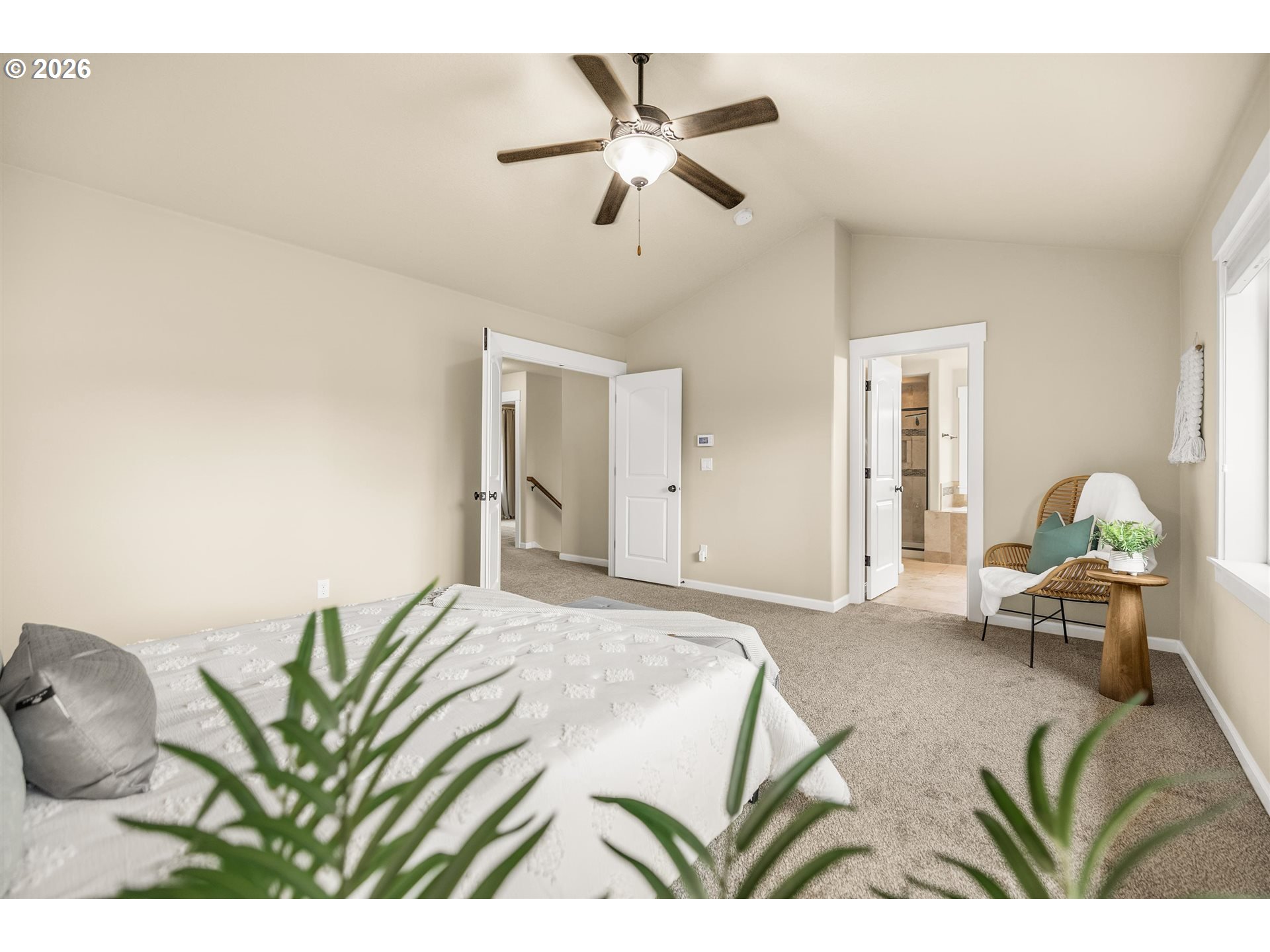 16073 Southeast Pinot Road Milwaukie, OR 97267 - Photo 20 of 44 a bedroom with a bed and ceiling fan