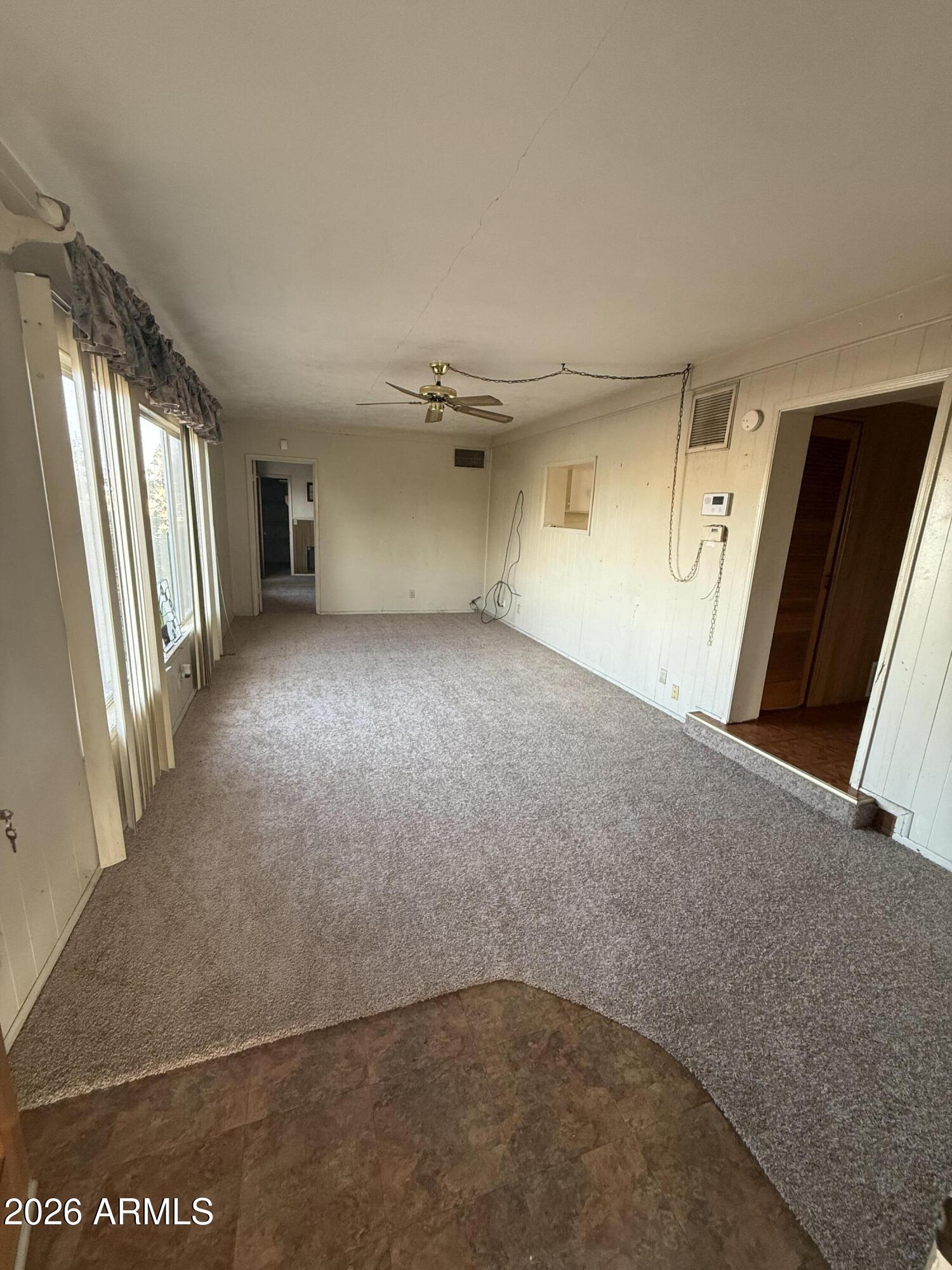 234 South 75th Way Mesa, AZ 85208 - Photo 6 of 18 an empty room with windows