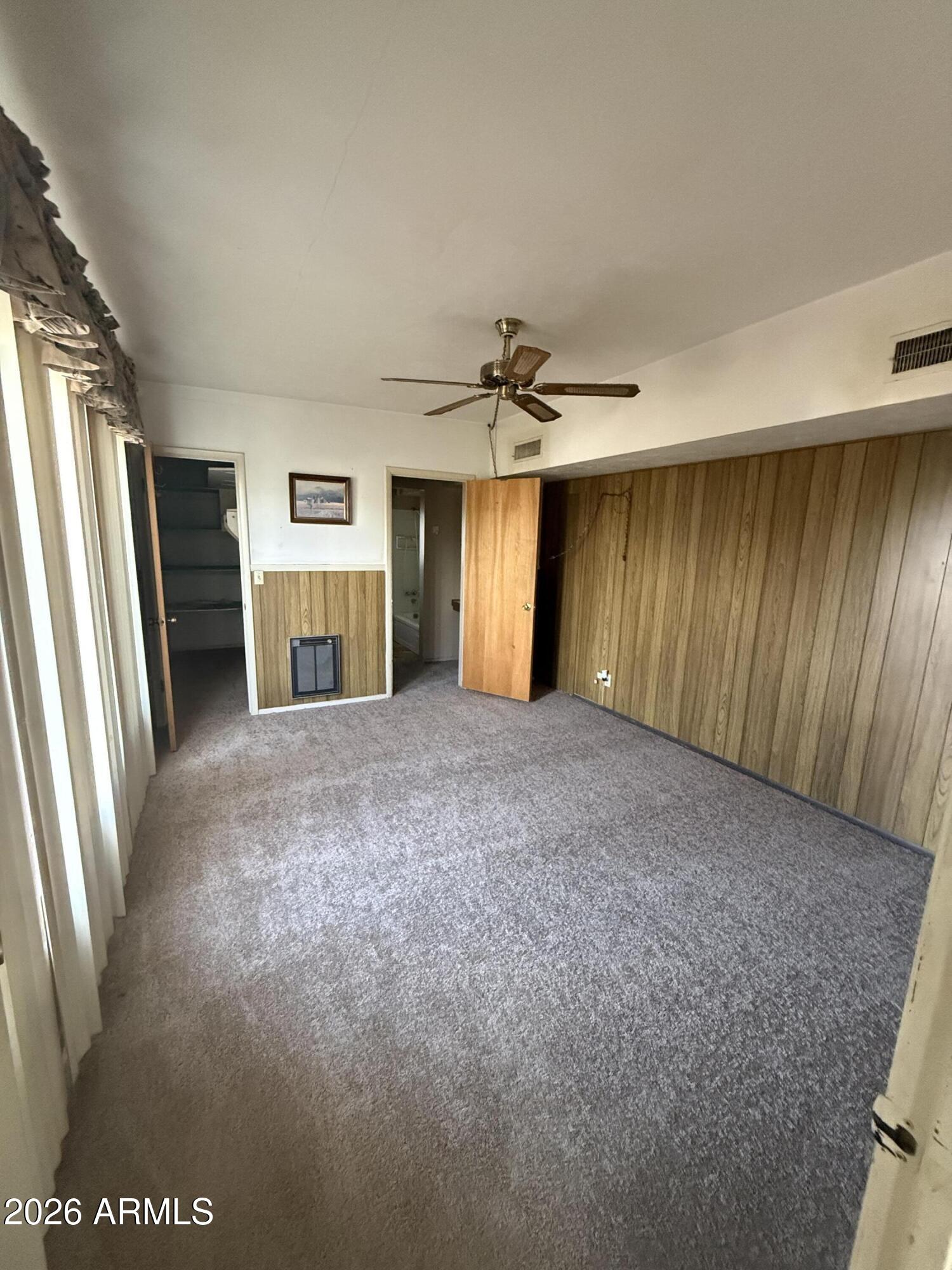 234 South 75th Way Mesa, AZ 85208 - Photo 7 of 18 a view of a livingroom with a fireplace and furniture