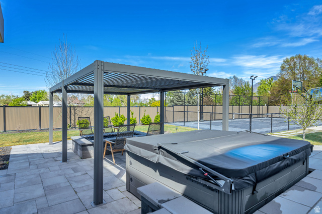 1720 Hillcrest Circle Mapleton, UT 84664 - Photo 101 of 116 View of patio / terrace with a hot tub and an outdoor fire pit