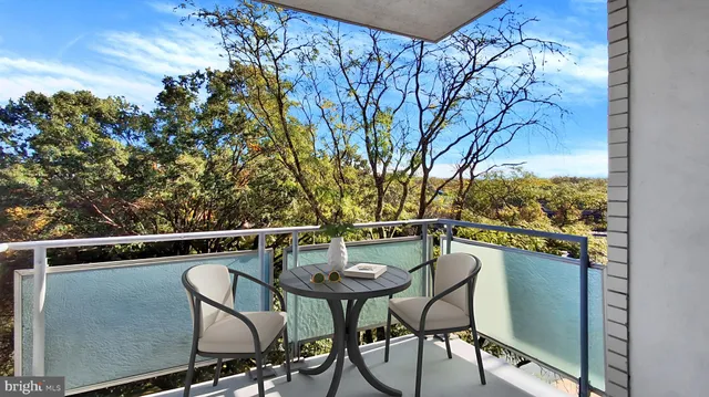 a view of a balcony with an outdoor space