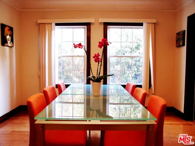 a view of a living room with a large window