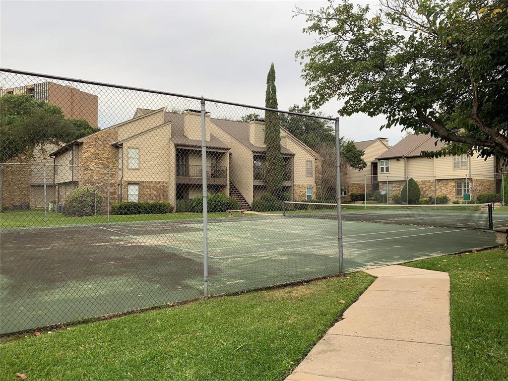 5300 Keller Springs Road, Unit 2020 Dallas, TX 75248 - Photo 14 of 15 a view of a house with a yard