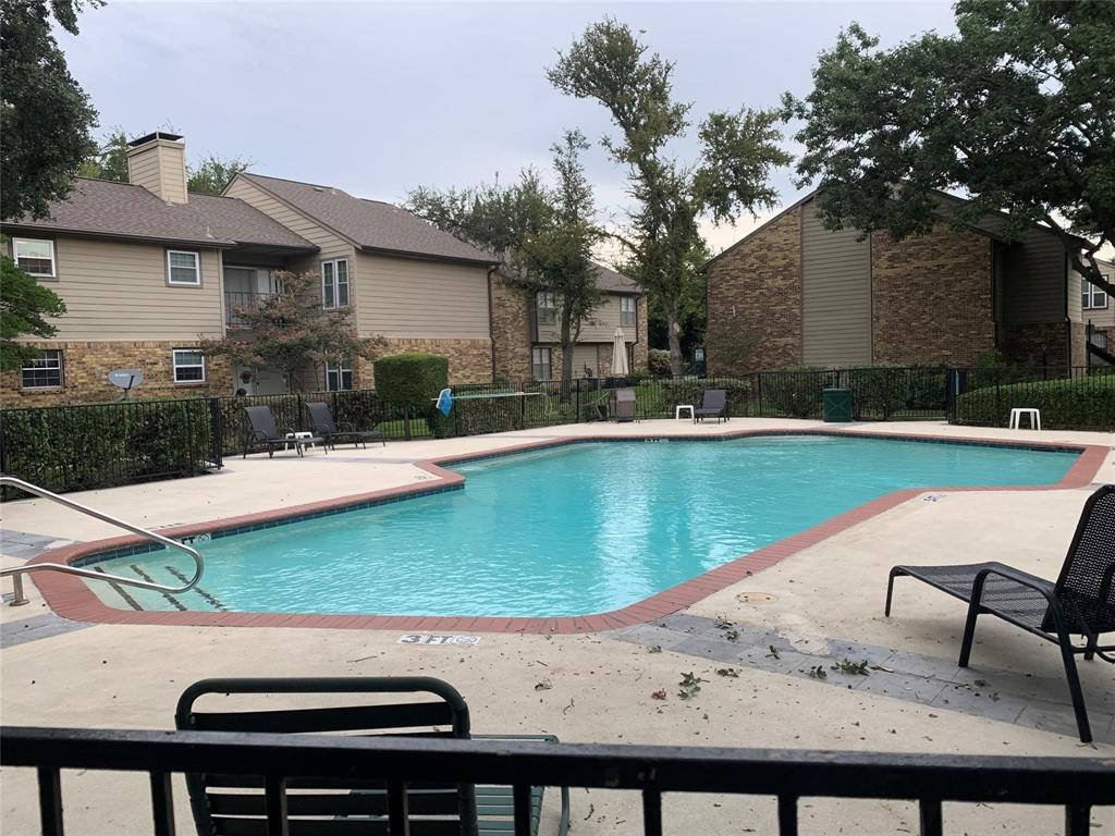 5300 Keller Springs Road, Unit 2020 Dallas, TX 75248 - Photo 15 of 15 a view of a swimming pool with a patio