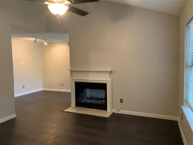 a living room with a fireplace