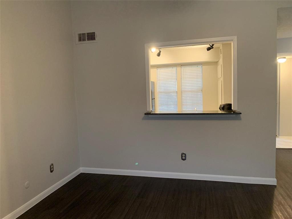 5300 Keller Springs Road, Unit 2020 Dallas, TX 75248 - Photo 7 of 15 an empty room with a window