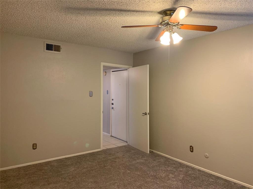5300 Keller Springs Road, Unit 2020 Dallas, TX 75248 - Photo 8 of 15 a view of an empty room