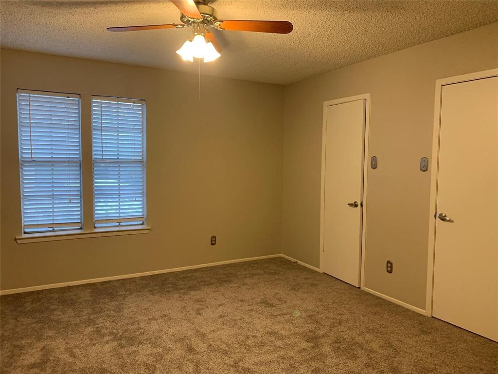 5300 Keller Springs Road, Unit 2020 Dallas, TX 75248 - Photo 9 of 15 a view of an empty room with a window