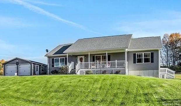 front view of house with a yard