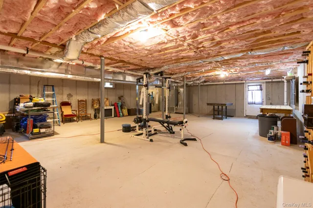 a view of a house with a big yard and garden