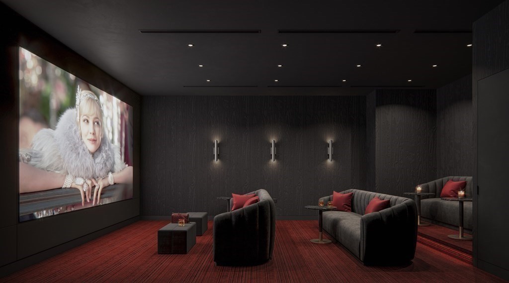 55 Lagrange Street, Unit 4G Boston, MA 02111 - Photo 7 of 11 a living room with furniture and wooden floor