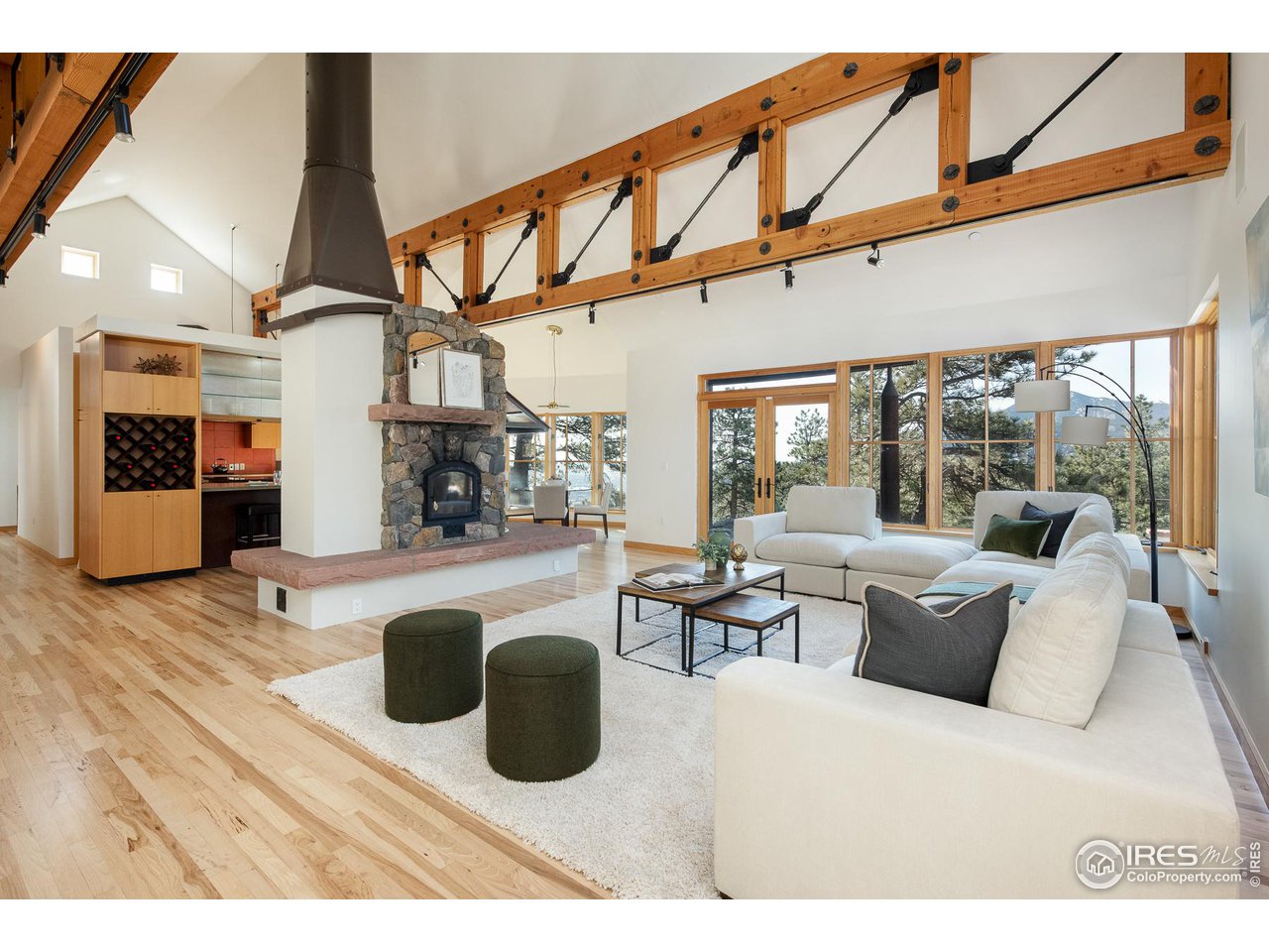 2358 Sunshine Canyon Drive Boulder, CO 80302 - Photo 1 of 36 a living room with furniture a large window and chairs