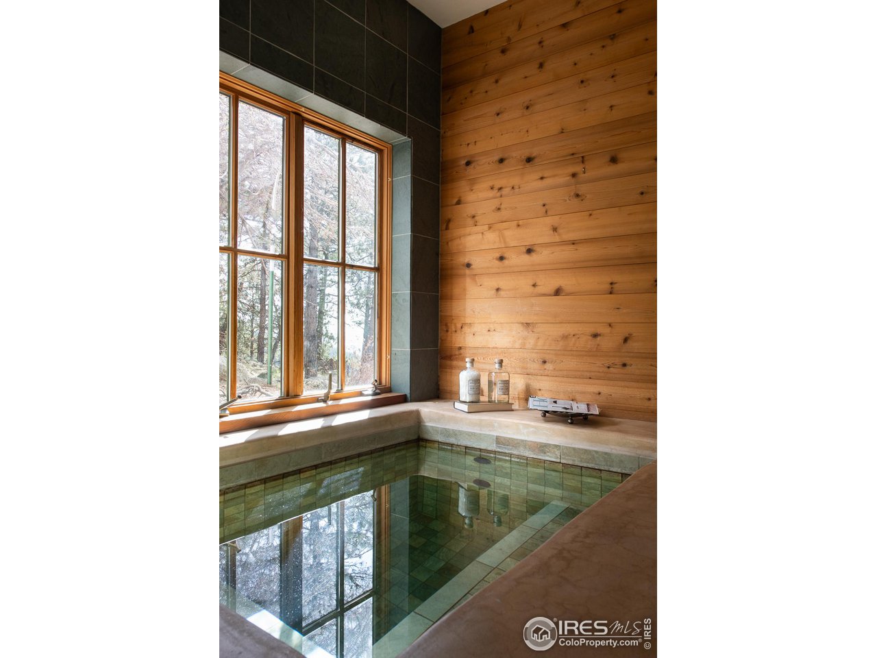 2358 Sunshine Canyon Drive Boulder, CO 80302 - Photo 14 of 36 a picture of a bathroom with a sink and a window