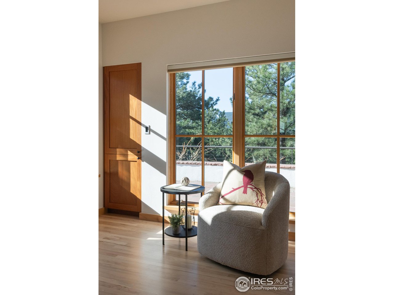 2358 Sunshine Canyon Drive Boulder, CO 80302 - Photo 16 of 36 a living room with furniture and a large window