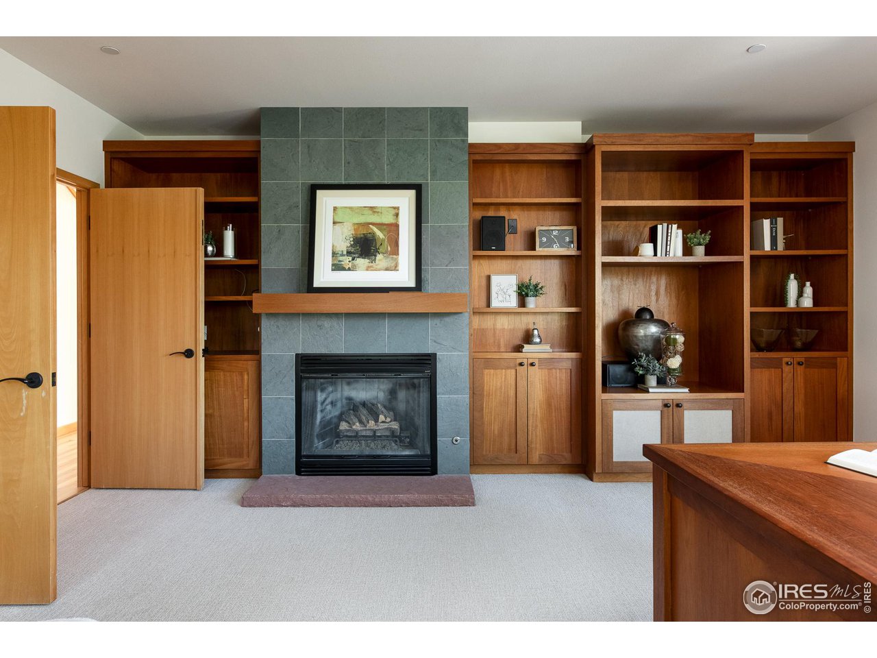 2358 Sunshine Canyon Drive Boulder, CO 80302 - Photo 19 of 36 a living room with furniture and a fireplace