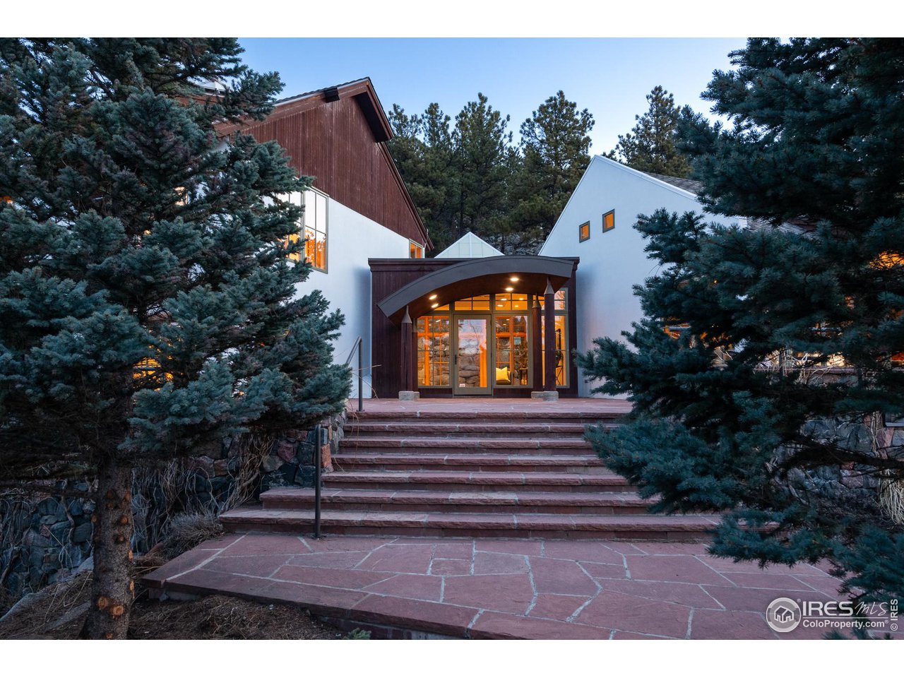 2358 Sunshine Canyon Drive Boulder, CO 80302 - Photo 28 of 36 a view of a house with a yard and potted plants