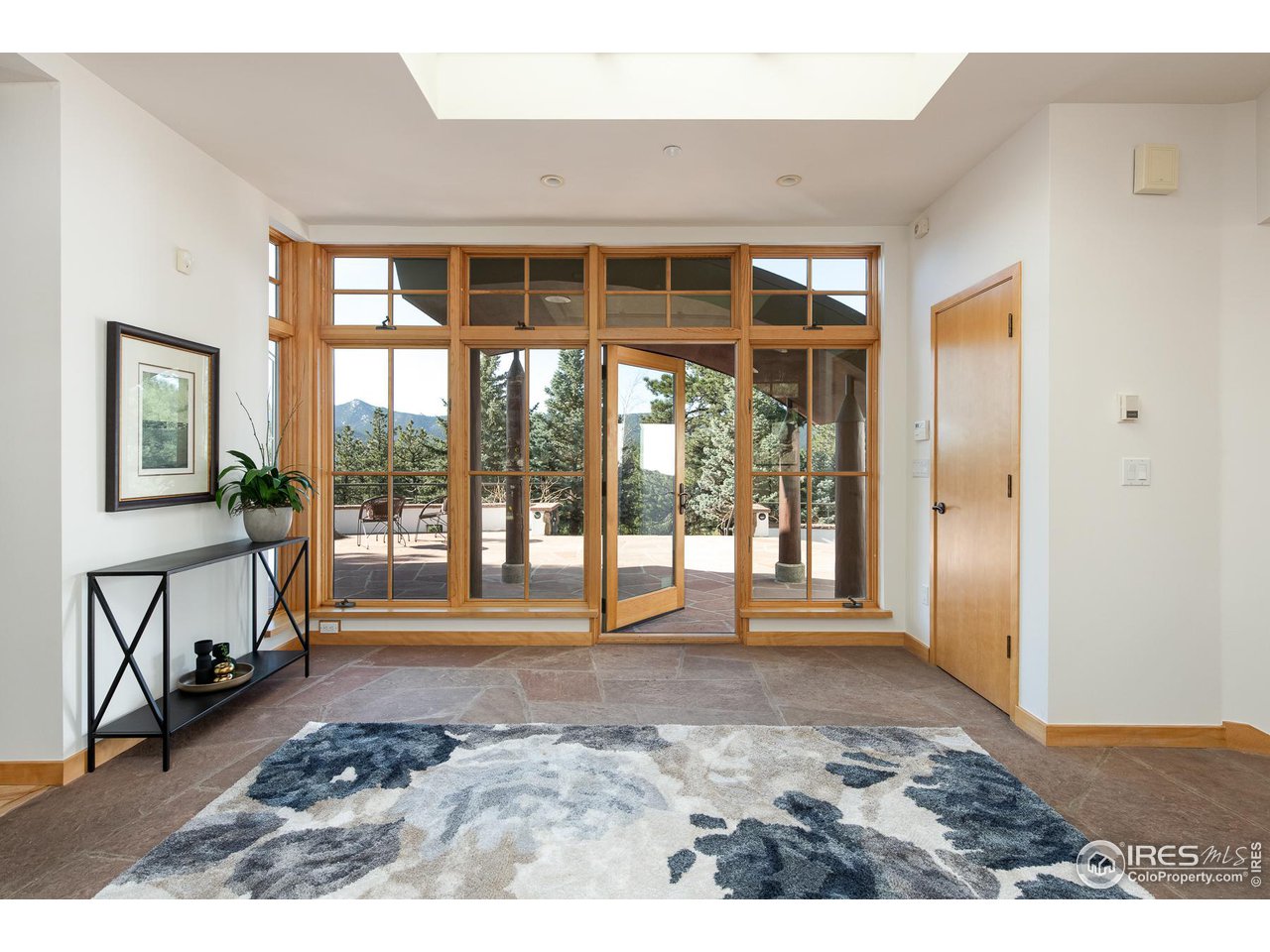 2358 Sunshine Canyon Drive Boulder, CO 80302 - Photo 3 of 36 a living room with a large window