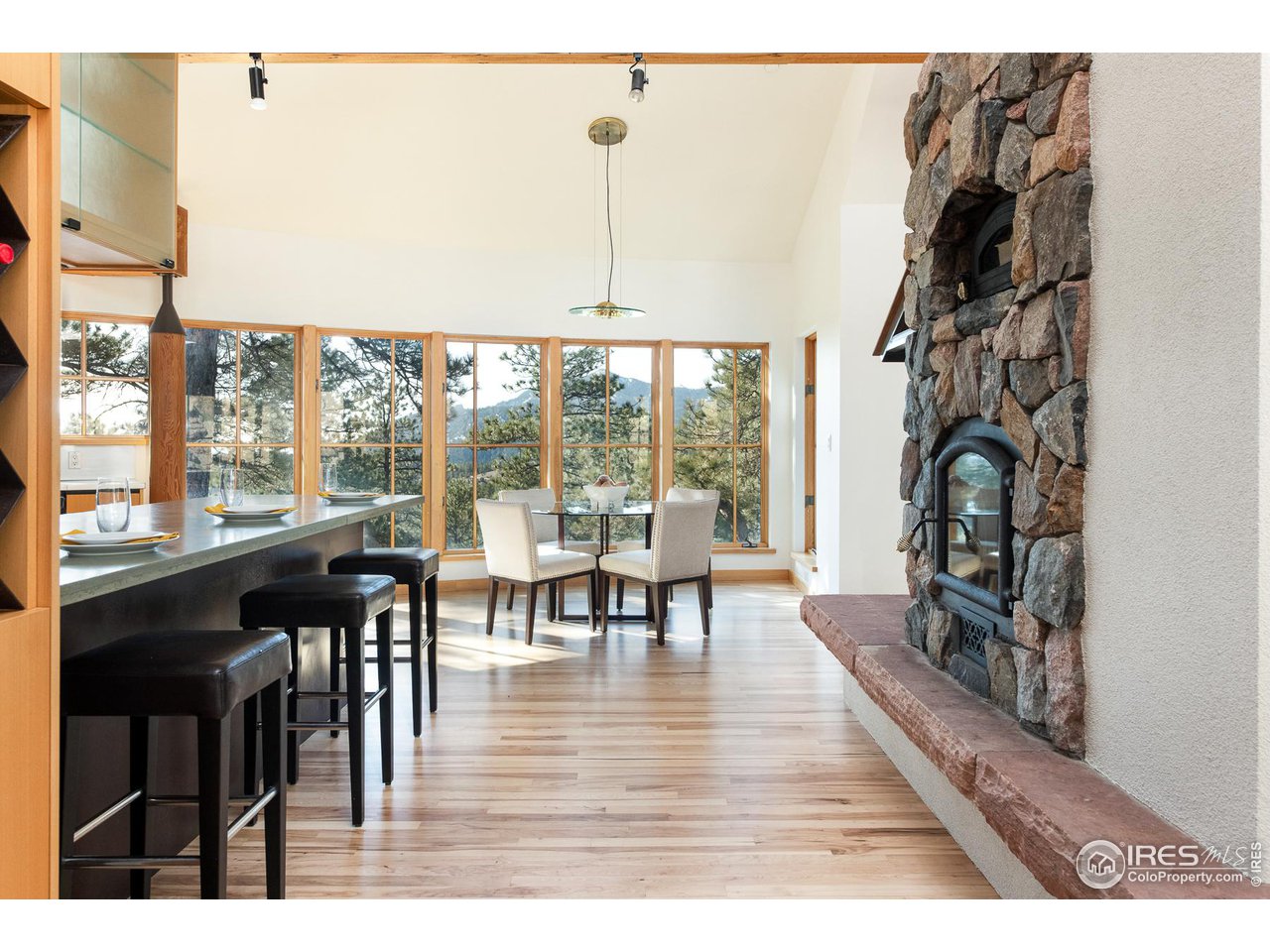 2358 Sunshine Canyon Drive Boulder, CO 80302 - Photo 7 of 36 a living room with furniture and a floor to ceiling window