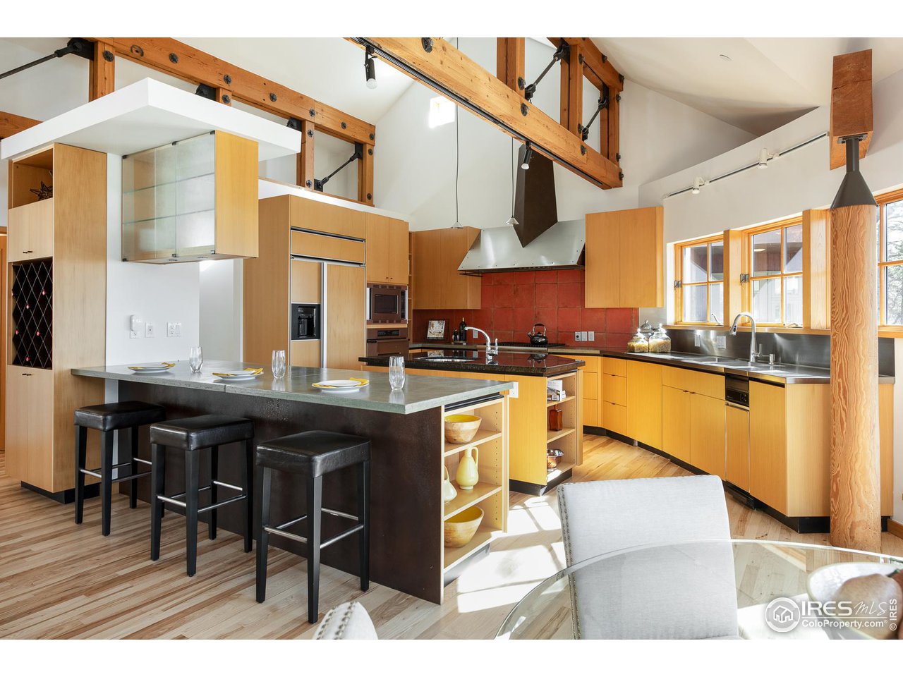 2358 Sunshine Canyon Drive Boulder, CO 80302 - Photo 8 of 36 a kitchen with stainless steel appliances granite countertop a stove and white cabinets