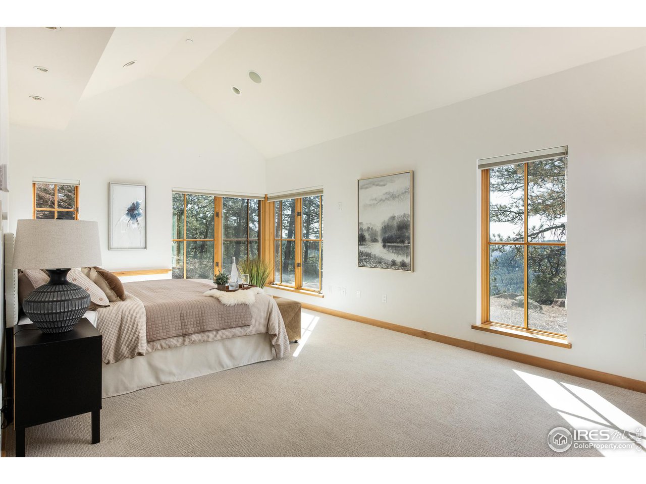 2358 Sunshine Canyon Drive Boulder, CO 80302 - Photo 10 of 36 a living room with a bed furniture and next to a window