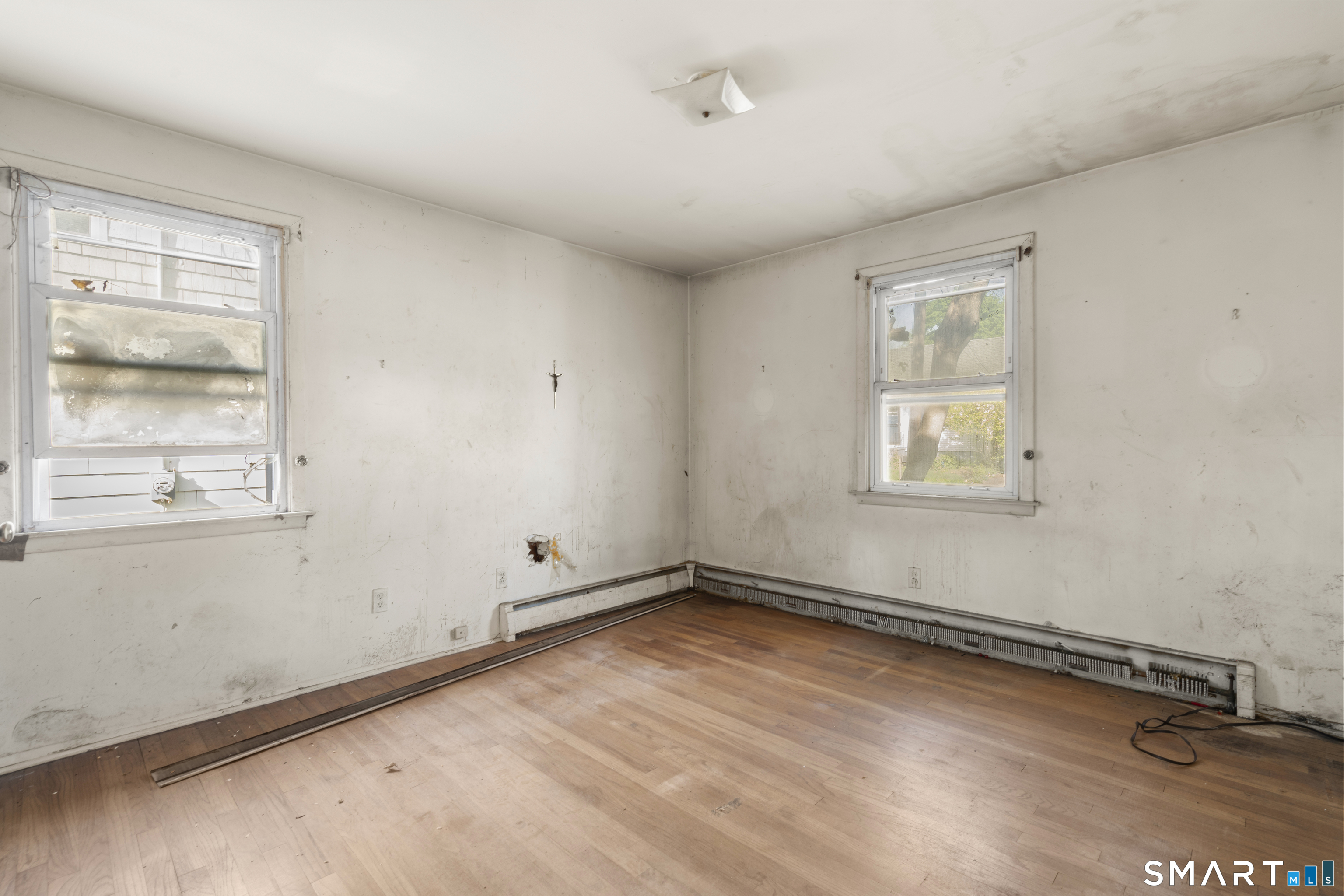 75 Brookside Avenue Bridgeport, CT 06606 - Photo 13 of 24 an empty room with windows