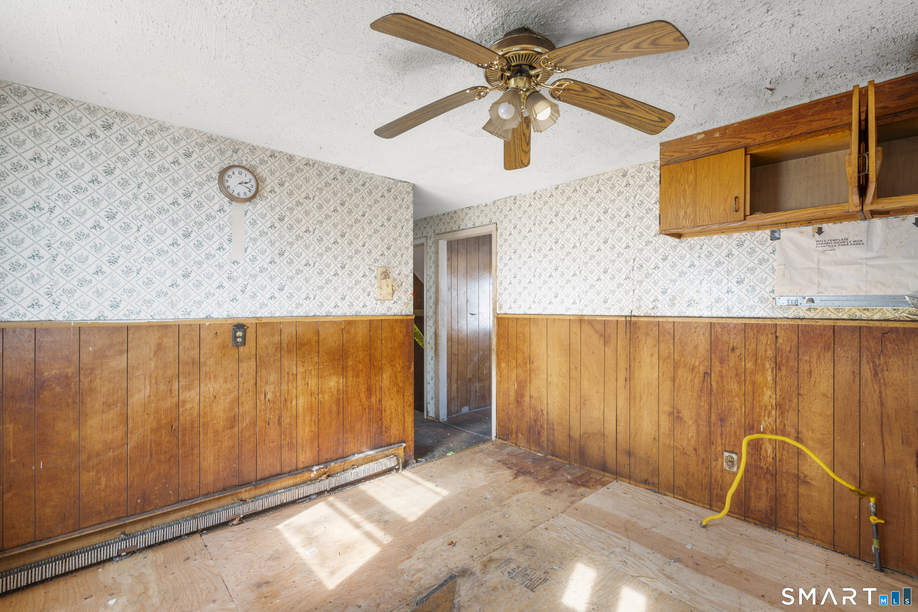 75 Brookside Avenue Bridgeport, CT 06606 - Photo 9 of 24 a view of a door with a ceiling fan