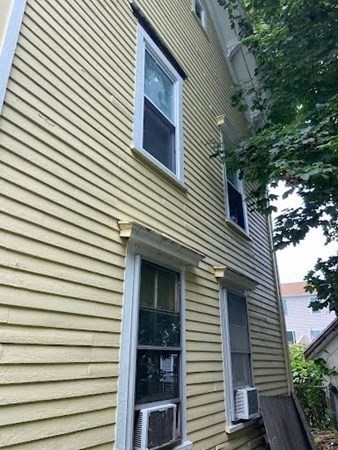 15 Varney Street Lowell, MA 01854 - Photo 18 of 32 a view of a house with a large window