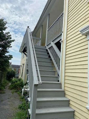 15 Varney Street Lowell, MA 01854 - Photo 19 of 32 a view of entryway with wooden floor