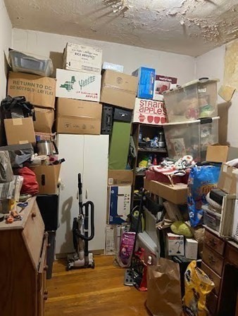 15 Varney Street Lowell, MA 01854 - Photo 30 of 32 a room with storage and utility