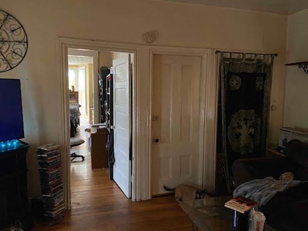 15 Varney Street Lowell, MA 01854 - Photo 32 of 32 a view of hallway with wooden floor