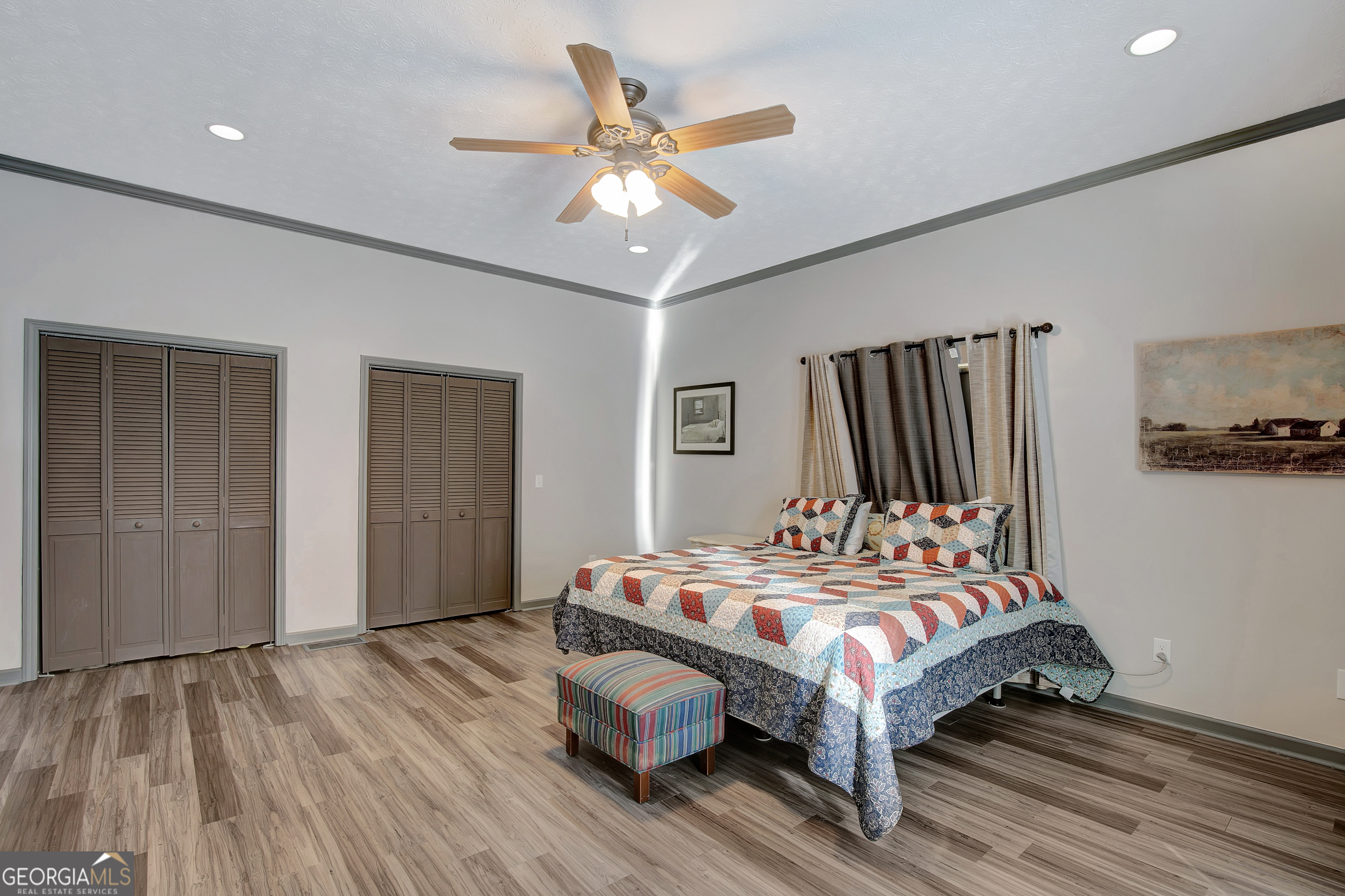 1188 Raymond Hill Road Newnan, GA 30265 - Photo 28 of 47 a bedroom with bed and a window
