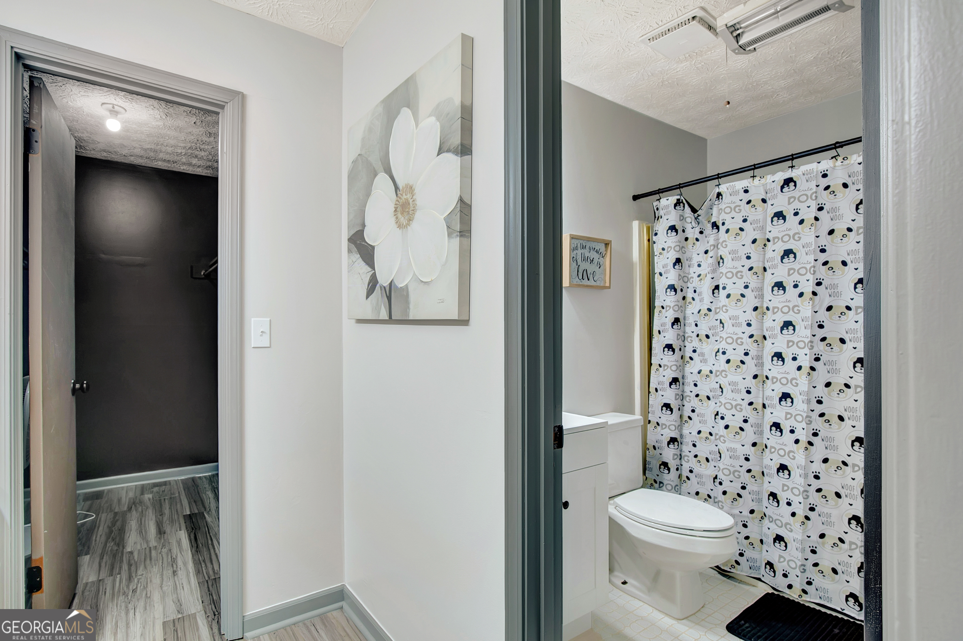 1188 Raymond Hill Road Newnan, GA 30265 - Photo 29 of 47 a bathroom with a toilet and a shower