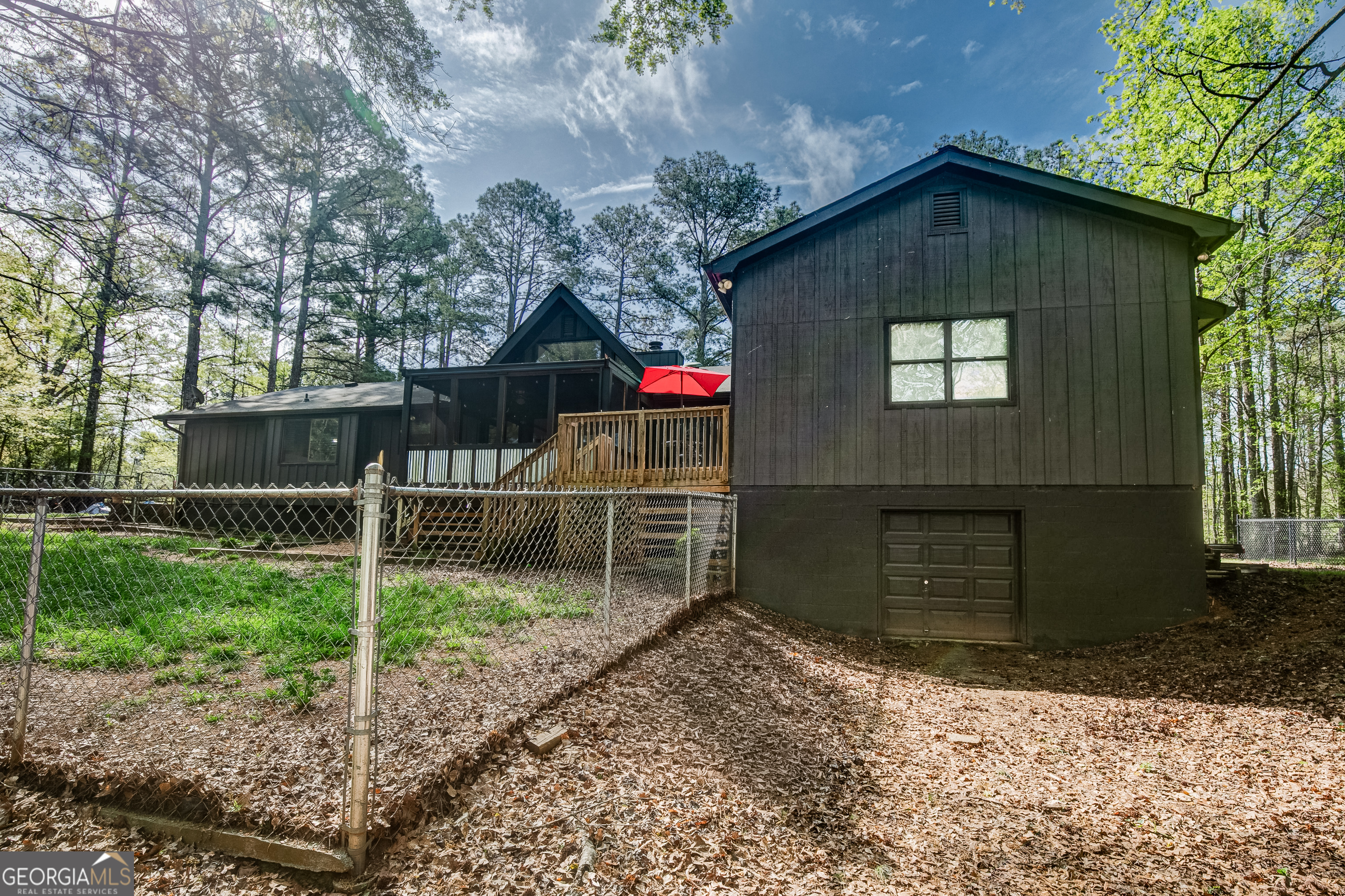 1188 Raymond Hill Road Newnan, GA 30265 - Photo 35 of 47 a front view of a house with a yard