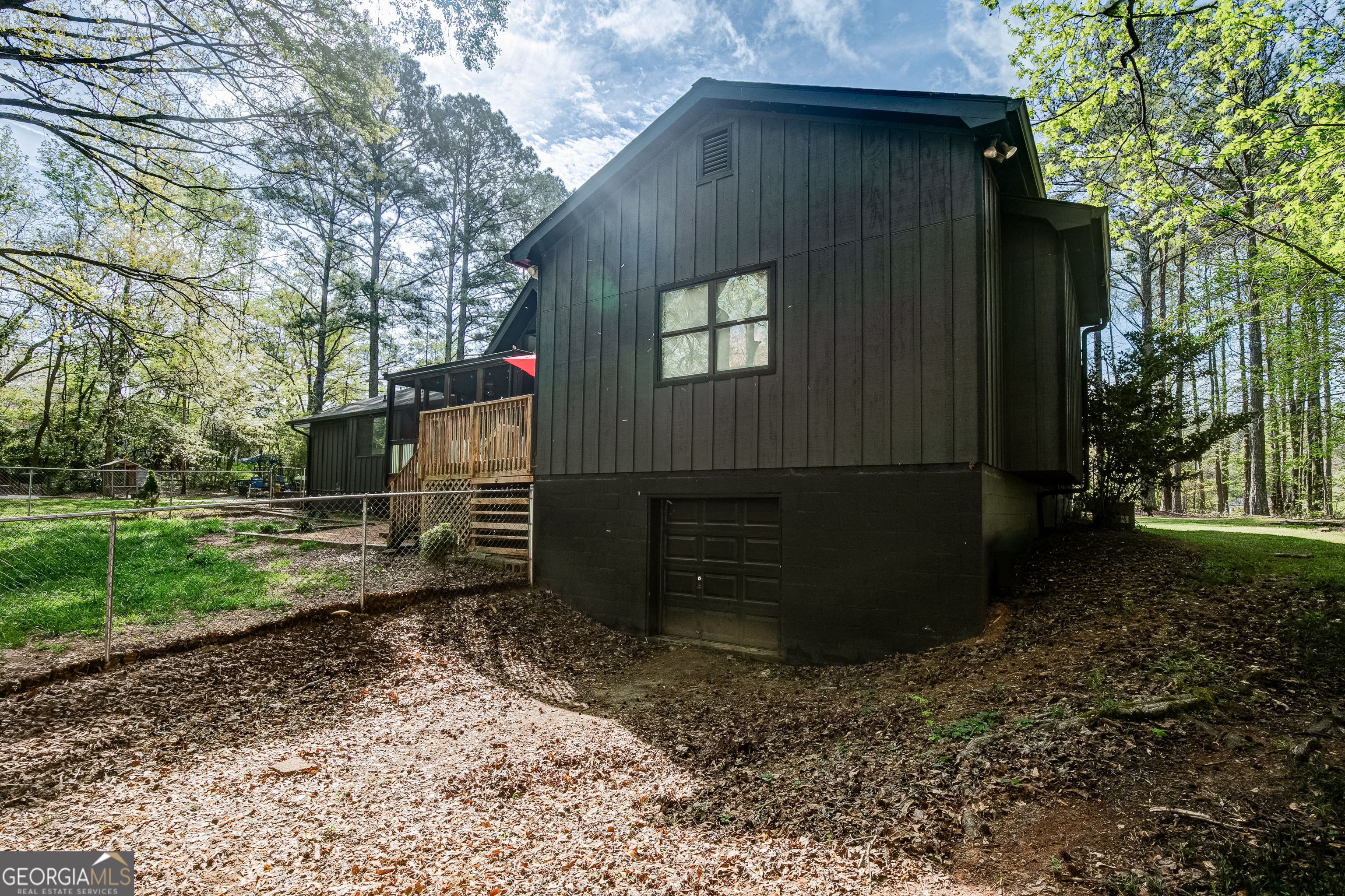 1188 Raymond Hill Road Newnan, GA 30265 - Photo 36 of 47 a front view of a house with a yard