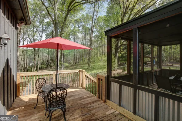 a view of a two chairs with an outdoor space