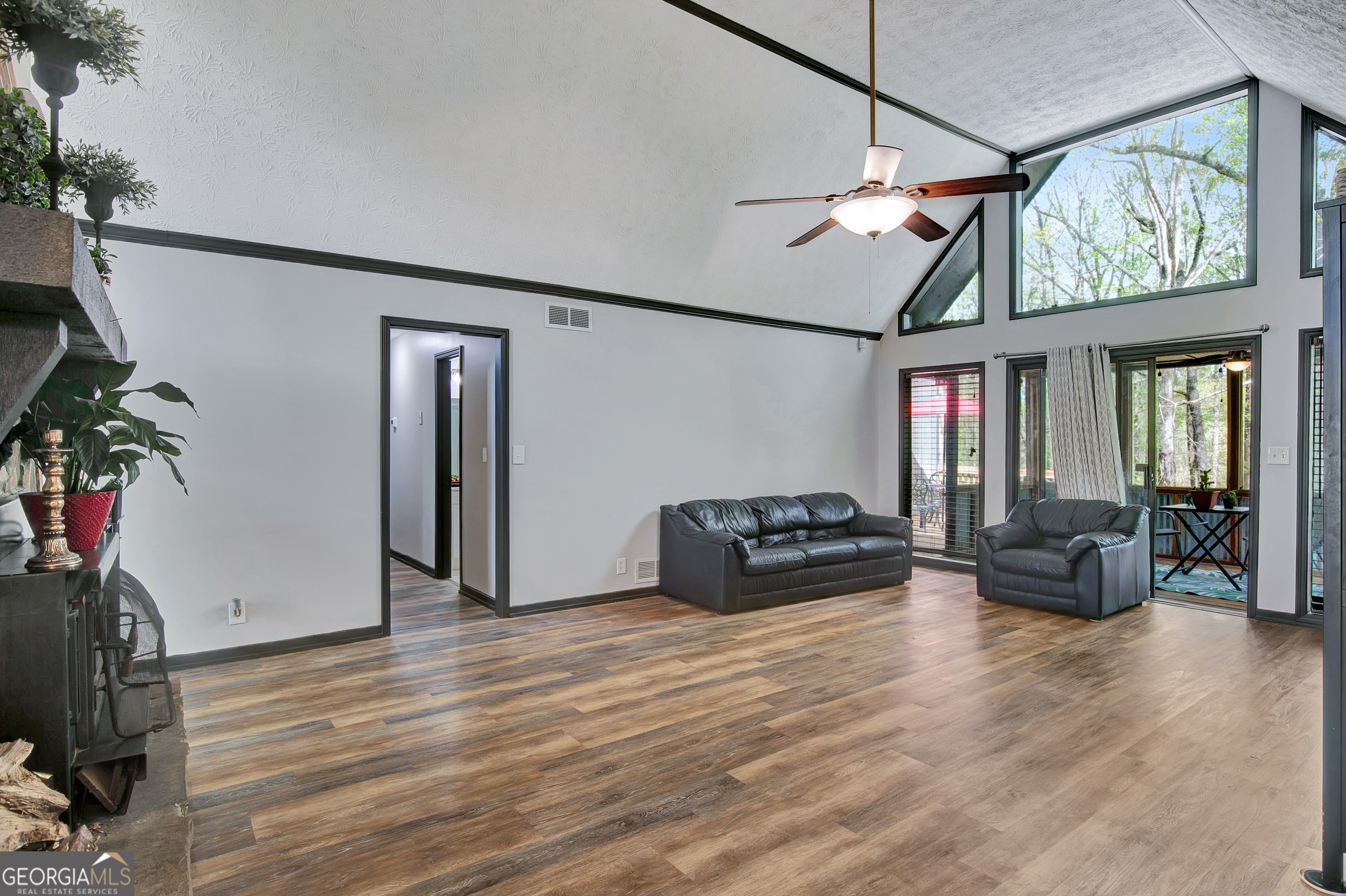 1188 Raymond Hill Road Newnan, GA 30265 - Photo 7 of 47 a living room with furniture