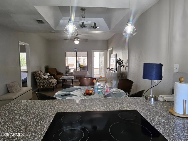 a kitchen with granite countertop lots of counter top space