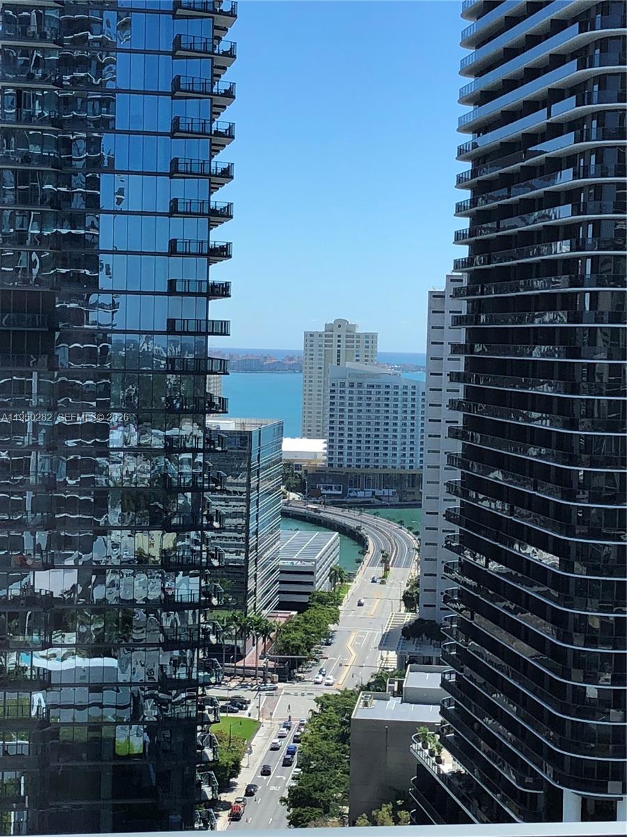 a view of a city with tall buildings
