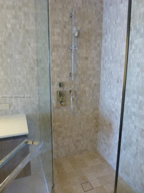 88 Southwest 7th Street, Unit 2203 Miami, FL 33130 - Photo 12 of 37 a bathroom with a shower