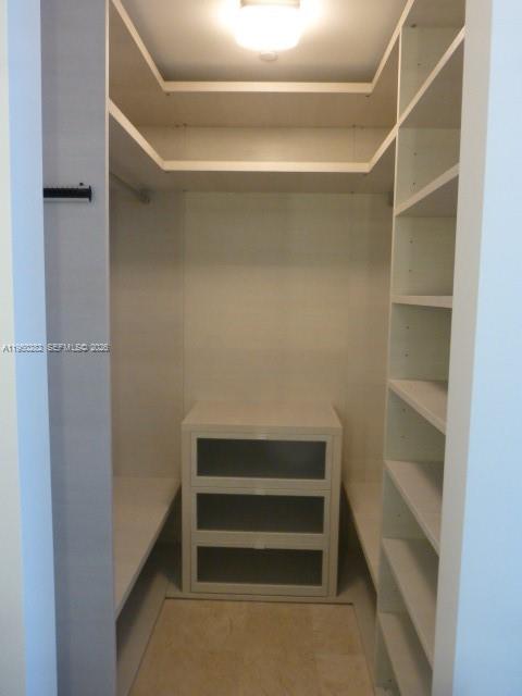 88 Southwest 7th Street, Unit 2203 Miami, FL 33130 - Photo 13 of 37 a view of walk in closet