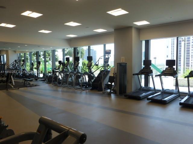 88 Southwest 7th Street, Unit 2203 Miami, FL 33130 - Photo 31 of 37 a view of a room with gym equipment