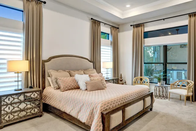 a view of a patio with table and chairs potted plants with wooden floor