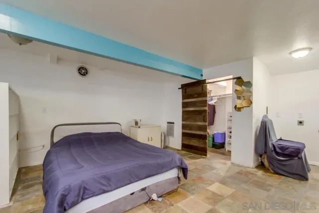 a kitchen with stainless steel appliances a sink stove and refrigerator