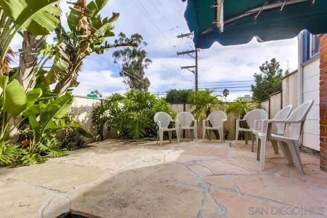 a view of a house with outdoor space and plants