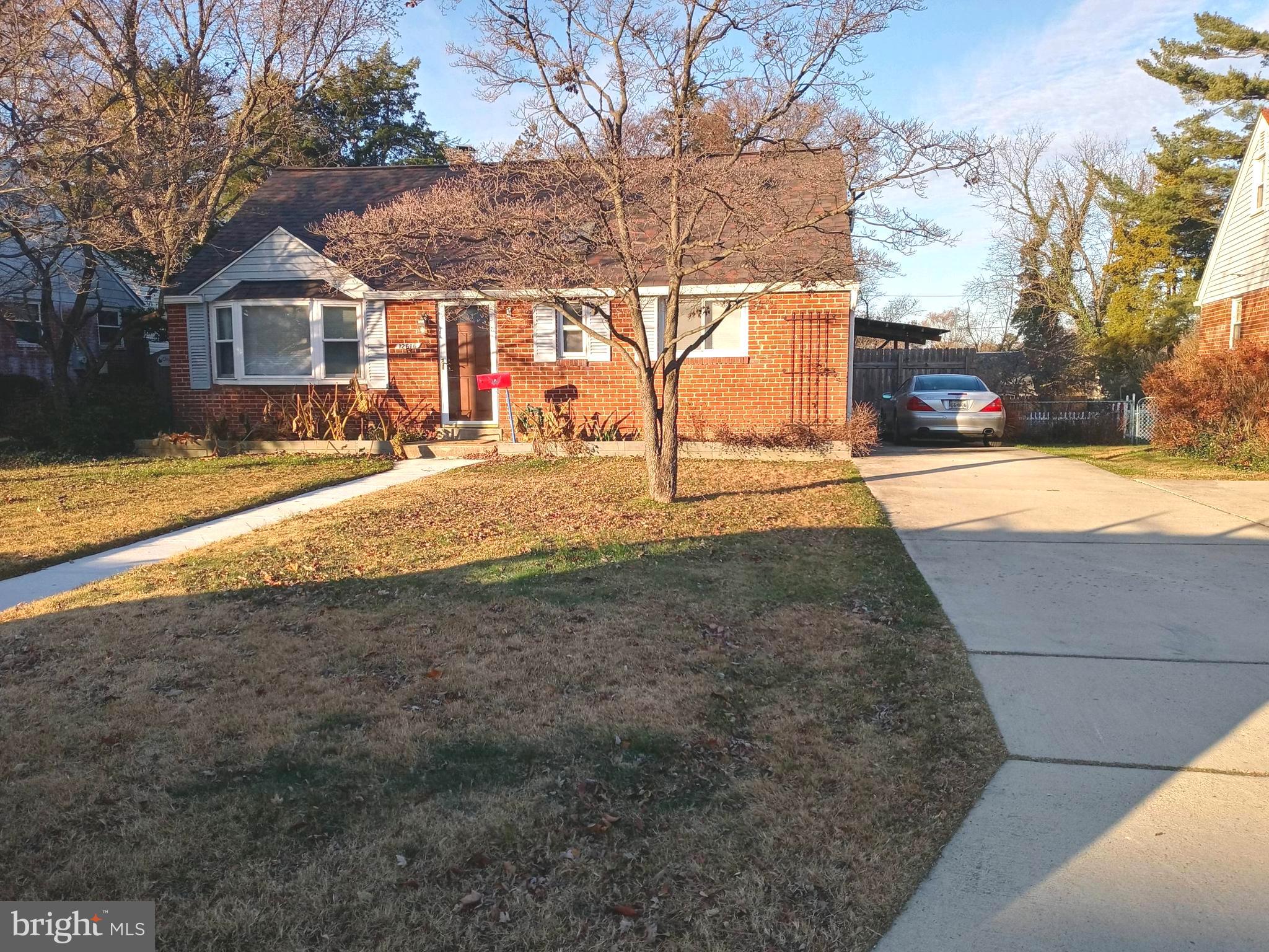 12616 Epping Road Silver Spring, MD 20906 - Photo 2 of 28 a view of a house with snow on the road