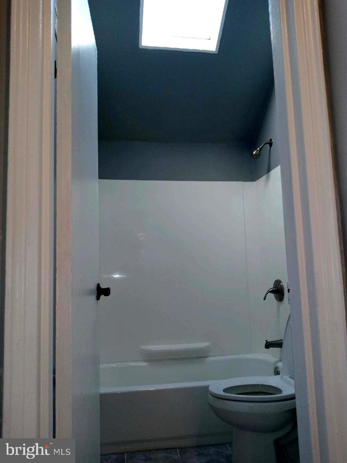 12616 Epping Road Silver Spring, MD 20906 - Photo 17 of 28 a bathroom with a toilet and a shower