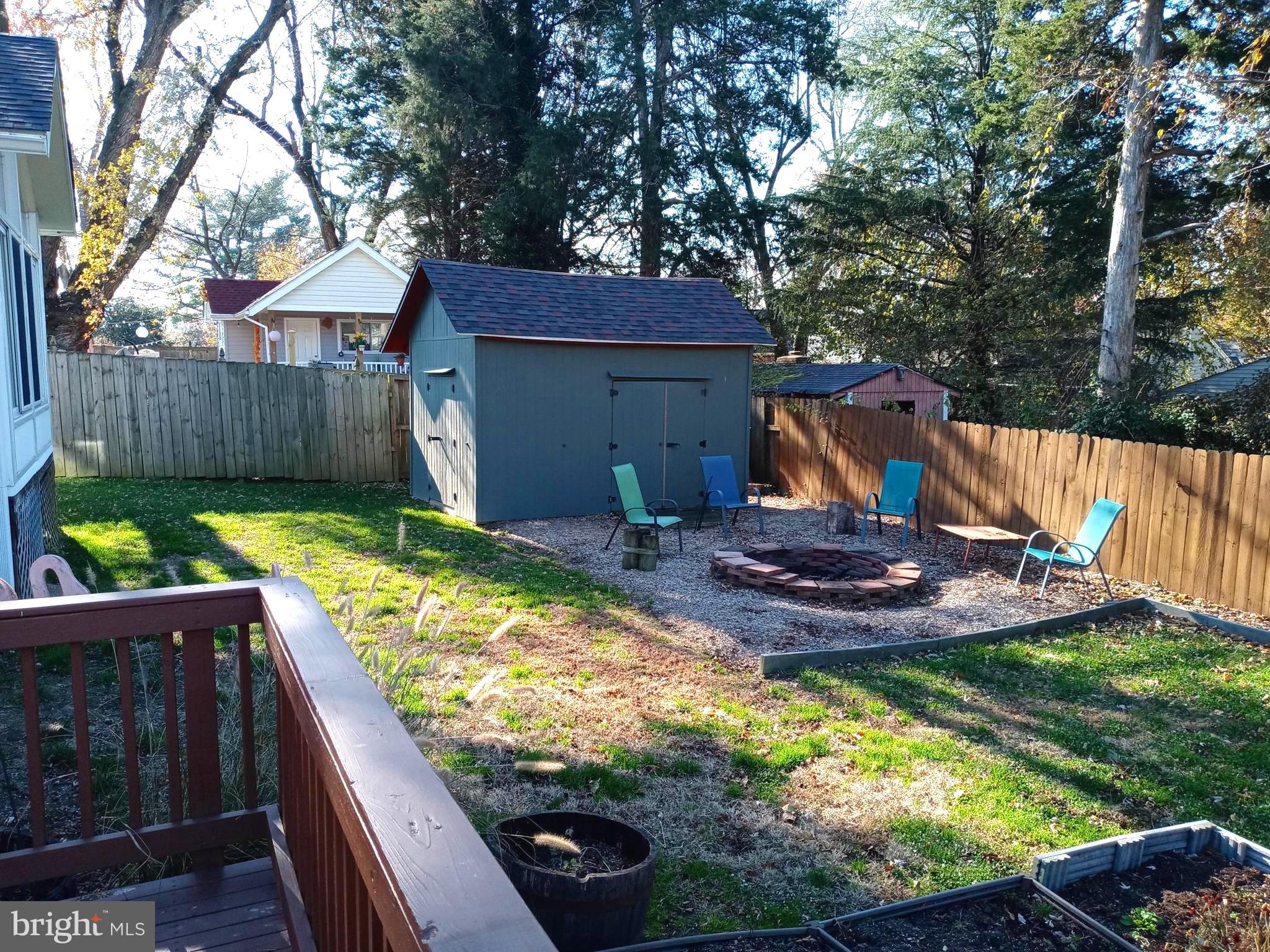 12616 Epping Road Silver Spring, MD 20906 - Photo 27 of 28 a view of backyard with wooden fence and a large tree