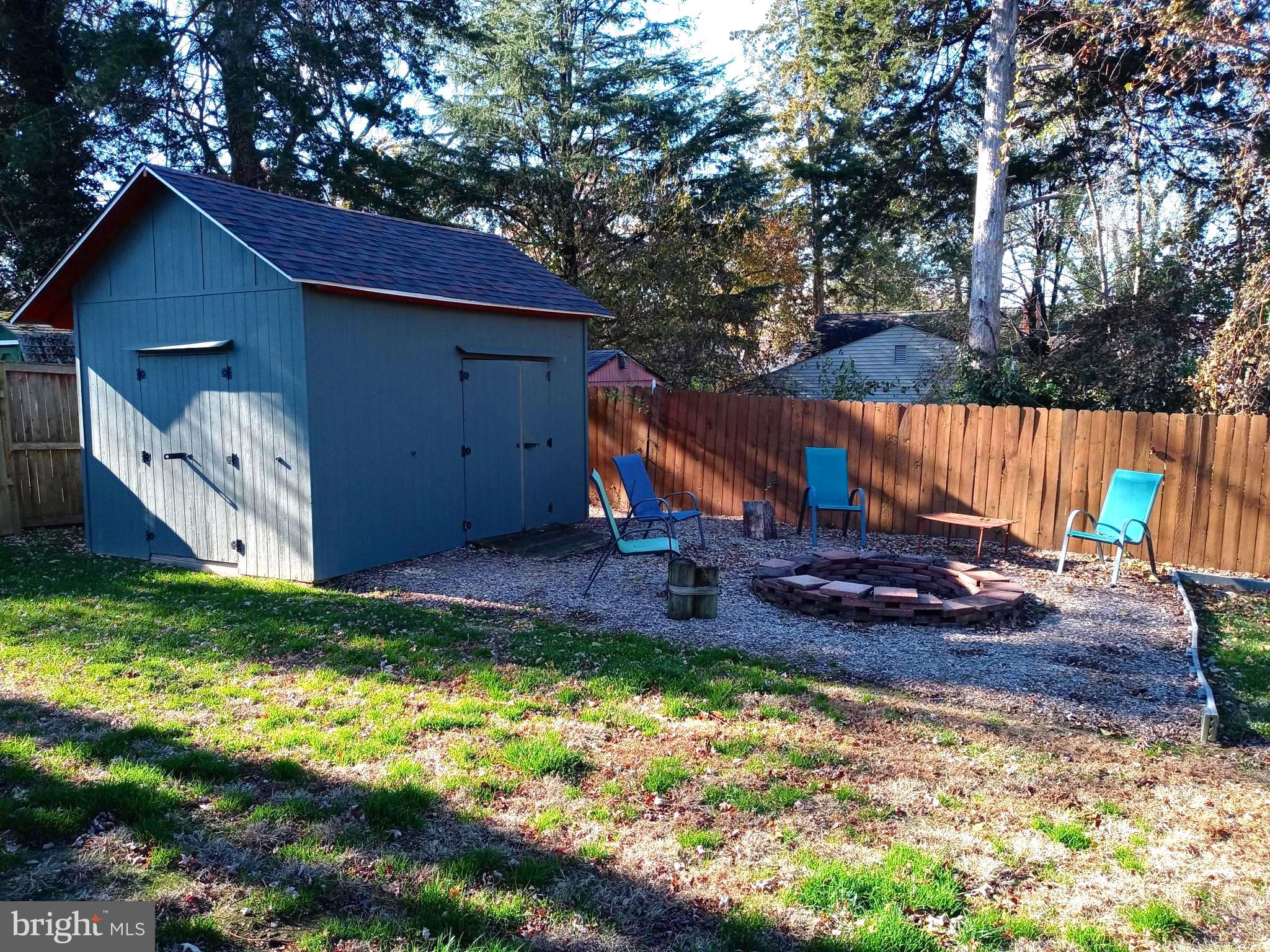 12616 Epping Road Silver Spring, MD 20906 - Photo 28 of 28 a view of backyard with wooden fence and a large tree