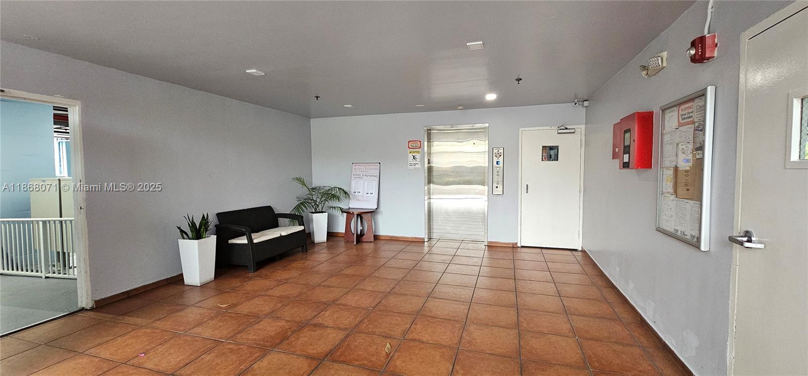 501 Southwest 1st Street, Unit 507 Miami, FL 33130 - Photo 21 of 25 a view of kitchen with furniture and an empty room